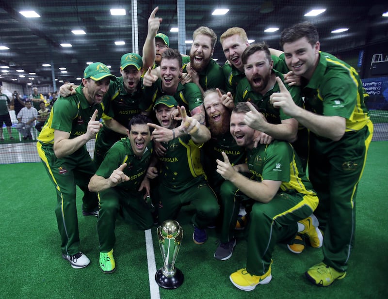 Australia players celebrate after winning the final match of the Indoor Cricket World Cup against New Zealand, Saturday, Sept. 23, 2017, in Dubai, United Arab Emirates. (AP Photo/Kamran Jebreili)