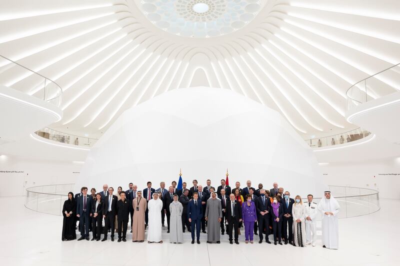 Sheikh Mohamed and Mr Macron inside the UAE pavilion, with Khaldoon Al Mubarak, chief executive and managing director of Mubadala, Jean-Yves Le Drian, French Minister for Europe and Foreign Affairs, Noura Al Kaabi, UAE Minister of Culture and Youth, Sheikh Abdullah bin Zayed, Minister of Foreign Affairs and International Co-operation, Sheikh Khaled bin Mohamed, a member of the Abu Dhabi Executive Council and chairman of the Abu Dhabi Executive Office, Reem Al Hashimy, Minister of State for International Co-operation and Director General of Expo 2020 Dubai and French ministers and executives. Photo: Ministry of Presidential Affairs