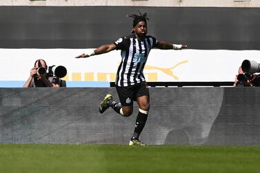 Newcastle's Allan Saint-Maximin reacts after his team's first goal during the English Premier League soccer match between Newcastle United and West Ham United at St James' Park, Newcastle, England, Saturday April 17, 2021. (AP Photo/Stu Forster/Pool)