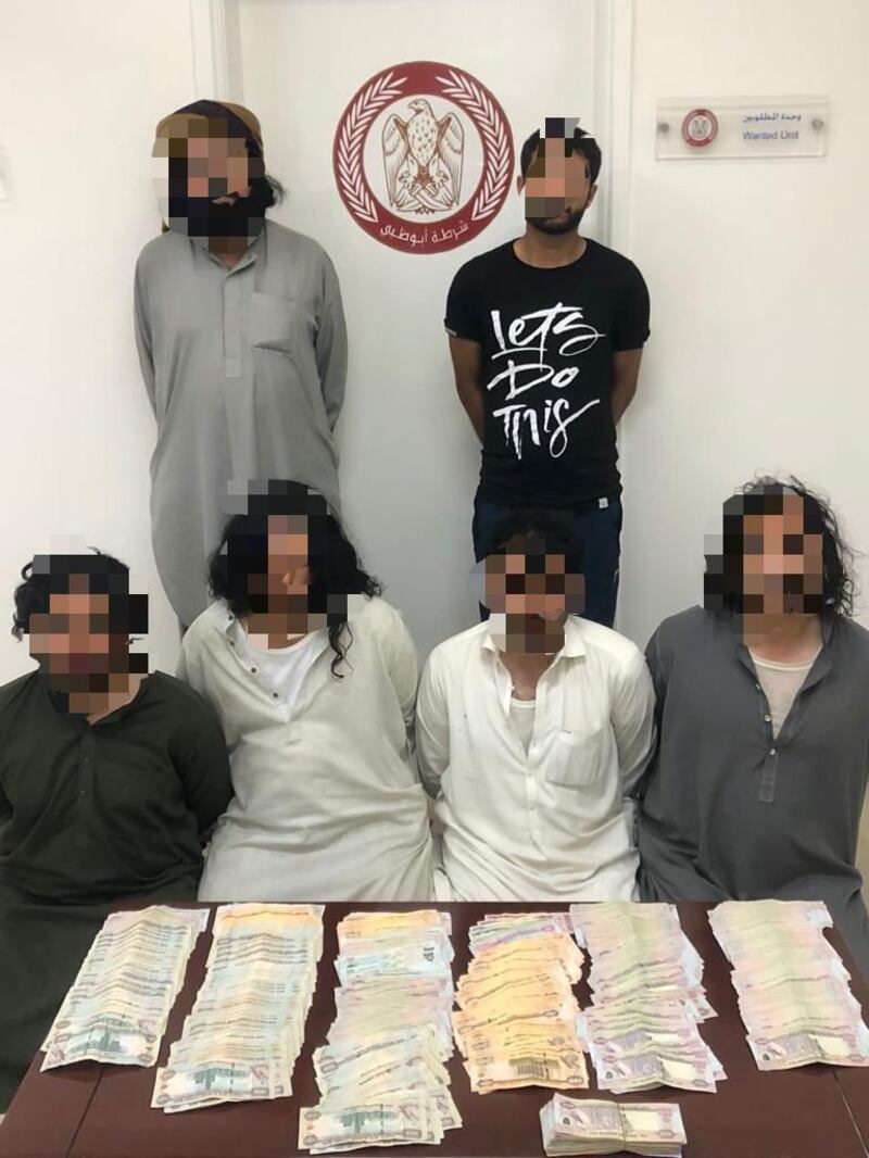 The gang of six men detained by Abu Dhabi Police on charges of fraud. Photo: Abu Dhabi Police