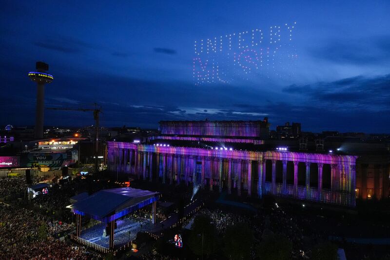 A drone display lights up the sky during the Eurovision welcome event at St George's Hall, Liverpool. Getty