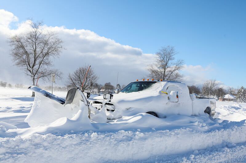 A snow plow is left stranded. Reuters