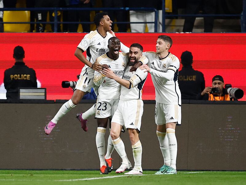 Ferland Mendy celebrates with teammates after scoring Real Madrid's second goal. Reuters