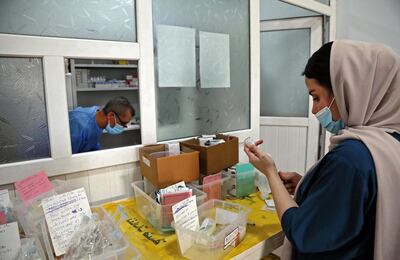 An Iraqi medic sorts through supplies at a hospital in Dohuk. AFP
