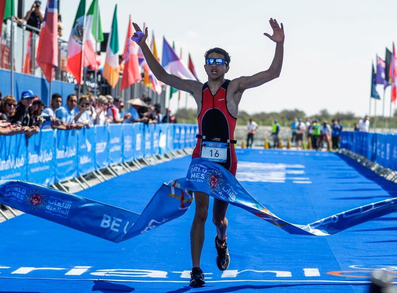 Abu Dhabi, United Arab Emirates, March 8, 2019.  Special Olympics ITU Traiathlon at the YAS Marina Circuit. --  Houdaifa Mohamed from Morocco crosses the line first.  (NOTE: this is not the final results yet, the final times are still being computed as of press time)
Besa/The National
Section:  NA
Reporter:  Haneen Dajani