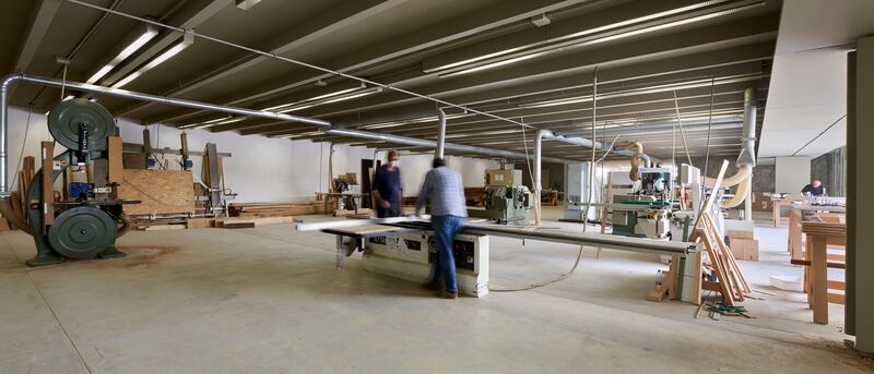 The central atrium surrounded by the exhibition space, where furniture samples are tested and made available for public use.