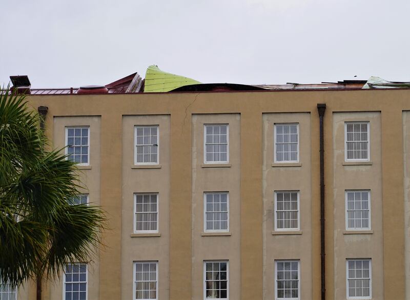 Hurricane Ian's powerful winds blow the roof off a hotel in Charleston, South Carolina. Photo: Willy Lowry / The National