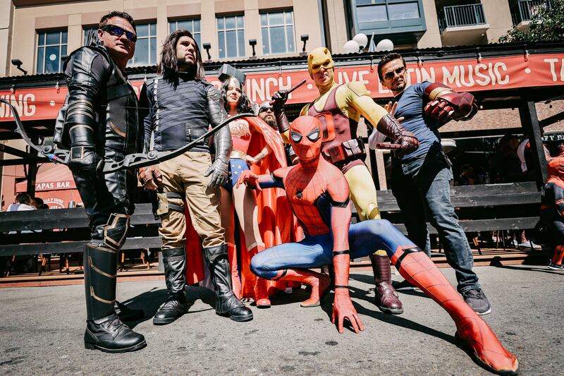 Cosplayers dressed as Hawkeye, Winter Soldier, Wonder Woman, Thor, Spider-Man, Daredevil and Tony Stark/Iron Man. AFP
