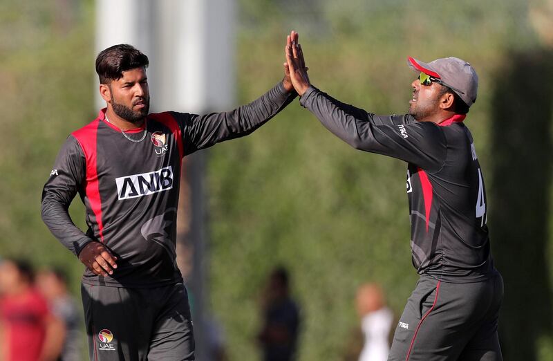 Dubai, United Arab Emirates - January 31, 2019: UAE's captain Mohammad Naveed takes the caught and bowled of Nepal's Sompal Kami in the the match between the UAE and Nepal in an international T20 series. Thursday, January 31st, 2019 at ICC, Dubai. Chris Whiteoak/The National