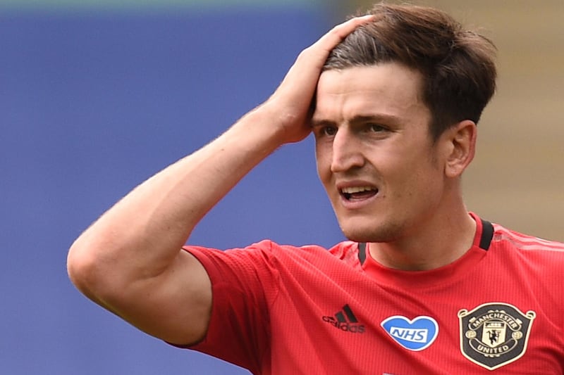 (FILES) In this file photo taken on July 26, 2020 Manchester United's English defender Harry Maguire reacts during the English Premier League football match between Leicester City and Manchester United at King Power Stadium in Leicester, central England. Manchester United and England defender Harry Maguire said on August 27, 2020 he was "scared" for his life and thought he was the victim of a kidnapping when he was arrested on a Greek holiday island. - RESTRICTED TO EDITORIAL USE. No use with unauthorized audio, video, data, fixture lists, club/league logos or 'live' services. Online in-match use limited to 120 images. An additional 40 images may be used in extra time. No video emulation. Social media in-match use limited to 120 images. An additional 40 images may be used in extra time. No use in betting publications, games or single club/league/player publications.
 / AFP / POOL / Oli SCARFF                           / RESTRICTED TO EDITORIAL USE. No use with unauthorized audio, video, data, fixture lists, club/league logos or 'live' services. Online in-match use limited to 120 images. An additional 40 images may be used in extra time. No video emulation. Social media in-match use limited to 120 images. An additional 40 images may be used in extra time. No use in betting publications, games or single club/league/player publications.
