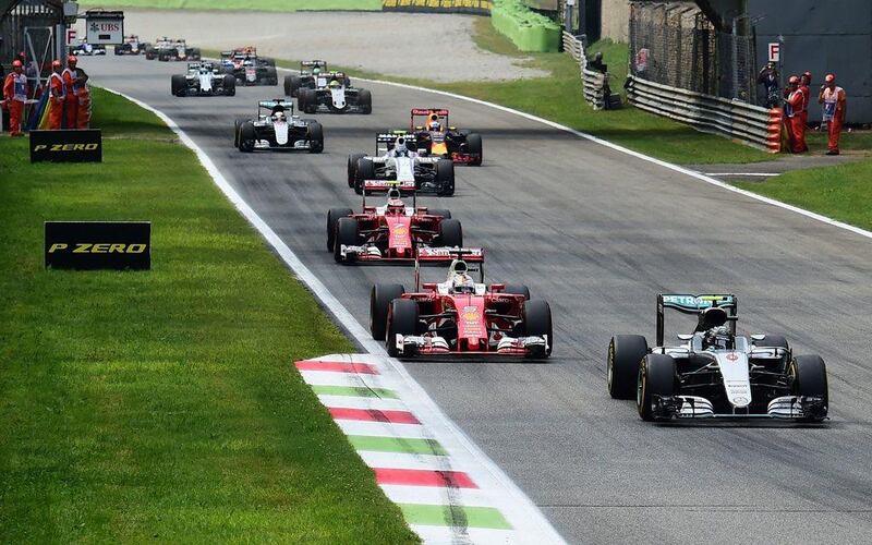 Mercedes driver Nico Rosberg pulls into first on Saturday, five places ahead of teammate Lewis Hamilton (back, left) at the Italian Grand Prix. Giuseppe Cacace / AFP / September 4, 2016 