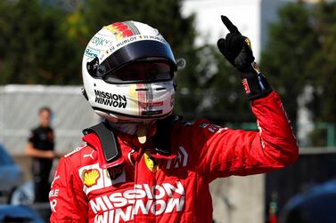 Sebastian Vettel celebrates his pole position for the Japanese Grand Prix. Reuters