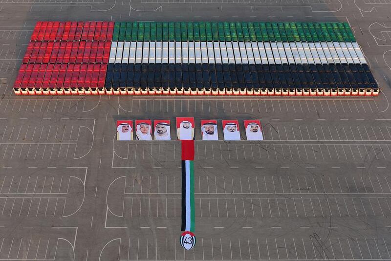 156 buses were used to create the UAE flag - setting a new world record.  Courtesy Department of Transport 