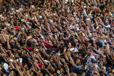The crowd gets ready for Shah Rukh Khan's appearance at Dalma Mall. Antonie Robertson / The National