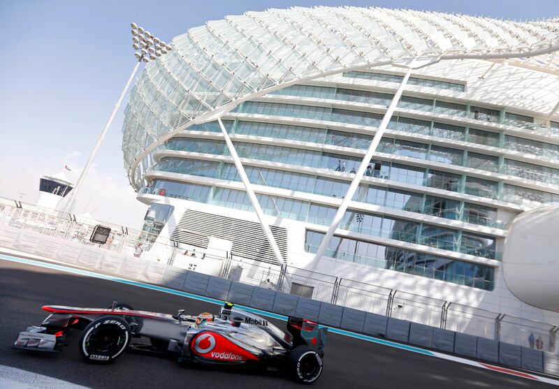 McLaren Formula One driver Lewis Hamilton of Britain drives during the third practice session of the Abu Dhabi F1 Grand Prix at the Yas Marina circuit on Yas Island November 3, 2012. REUTERS/Darren Whiteside (UNITED ARAB EMIRATES  - Tags: SPORT MOTORSPORT F1)   *** Local Caption ***  PSQ63_MOTOR-RACING-_1103_11.JPG