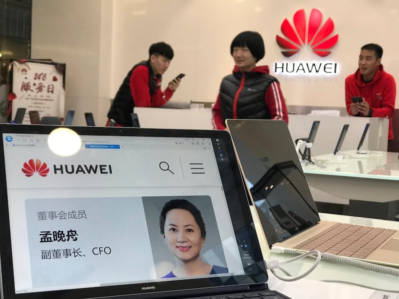 A profile of Huawei's chief financial officer Meng Wanzhou is displayed on a Huawei computer at a Huawei store in Beijing, China, Thursday, Dec. 6, 2018. Canadian authorities said Wednesday that they have arrested Meng for possible extradition to the United States. (AP Photo/Ng Han Guan)