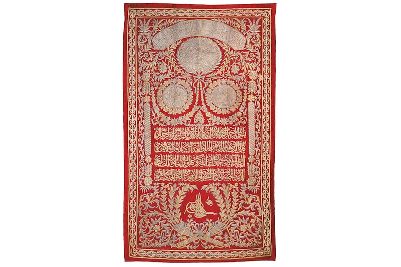 The red silk and silver embroidery curtain for the Rawdah of the Prophet’s Mosque, commissioned by Sultan Mahmud II; Turkey, 1808–39. Photo: The Khalili Collections
