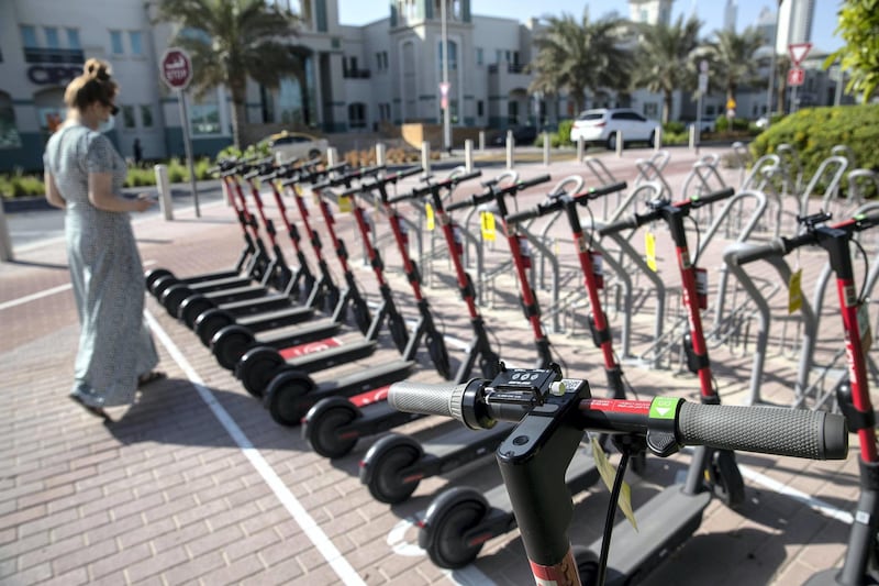 DUBAI, UNITED ARAB EMIRATES. 26 OCTOBER 2020. E-scooter trials rolled out in five areas across city for a year long project for commuters to rent and use e-scooters while commuting to and from tram and metro stations. SKURTT e-scooters for rent in Knowledge Village. (Photo: Antonie Robertson/The National) Journalist: Kelly Clarke. Section: National.