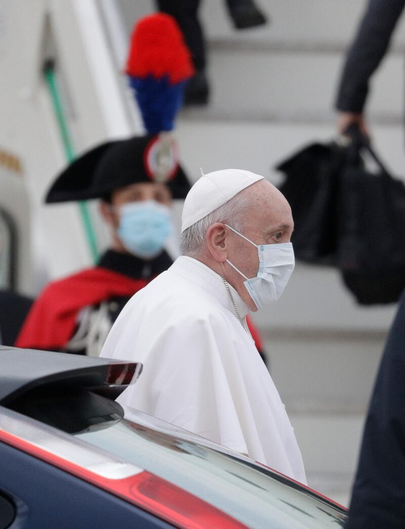 Pope Francis prepares to leave from Fiumicino's International airport Leonardo da Vinci, near Rome, for Baghdad, Iraq, Friday, March 5, 2021. Pope Francis is bound to Iraq for a four-day visit to urge the country's dwindling number of Christians to stay put and help rebuild the country after years of war and persecution, brushing aside the coronavirus pandemic and security concerns to make the first-ever papal visit. (AP Photo/Gregorio Borgia).