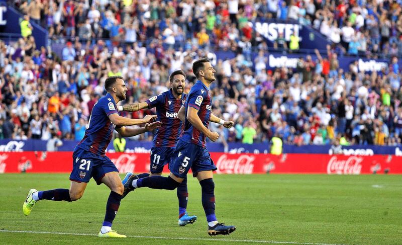 Levante midfielder Nemanja Radoja, right, after scoring against Barcelona in Valencia. EPA