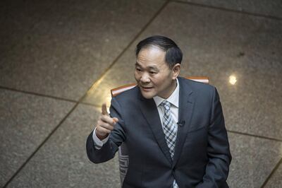 Li Shufu, chairman of Zhejiang Geely Holding Group Co., sits for a Bloomberg Television interview on the sidelines of the 13th National People's Congress (NPC) in Beijing, China, on Thursday, March 8, 2018. Collaboration isn't a precondition for Geely founder Li to acquire a stake in Daimler AG because the Chinese billionaire sees the German luxury-car maker as a top investment -- even without synergies with his own automaking group. Photographer: Qilai Shen/Bloomberg