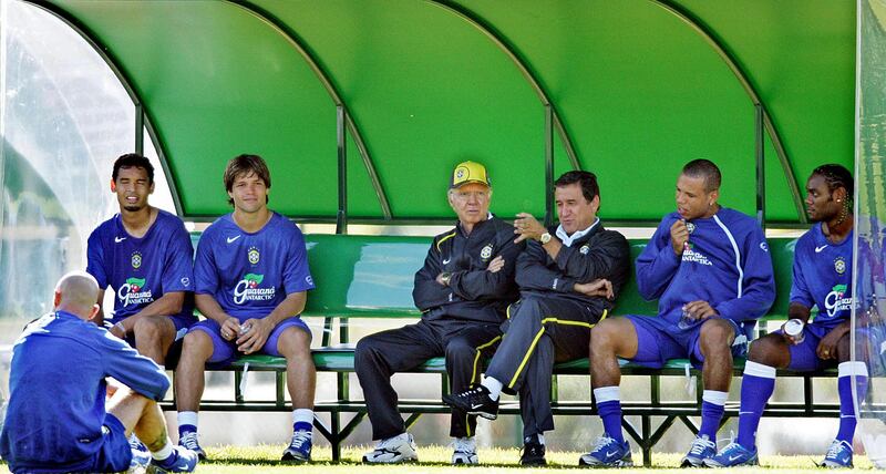 Brazil coach Carlos Alberto Parreira, third right, and supervisor Mario Zagallo, fourth right, chat with players at the 2004 Copa America. AFP