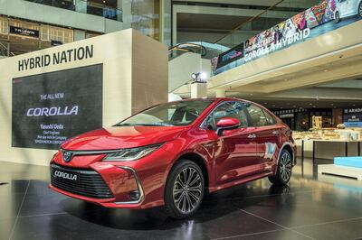 The Corolla emphasises its hybrid credentials.