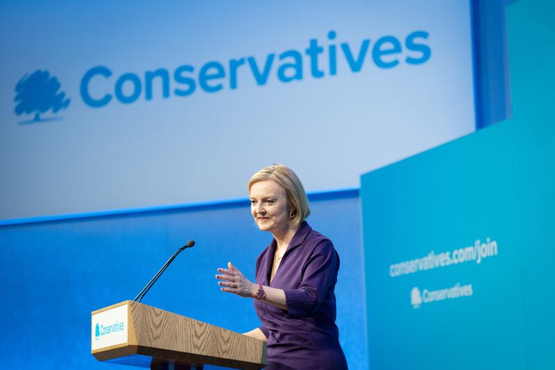 Liz Truss speaks at the Queen Elizabeth II Centre in London after being announced as the new Conservative Party leader and prime minister. PA