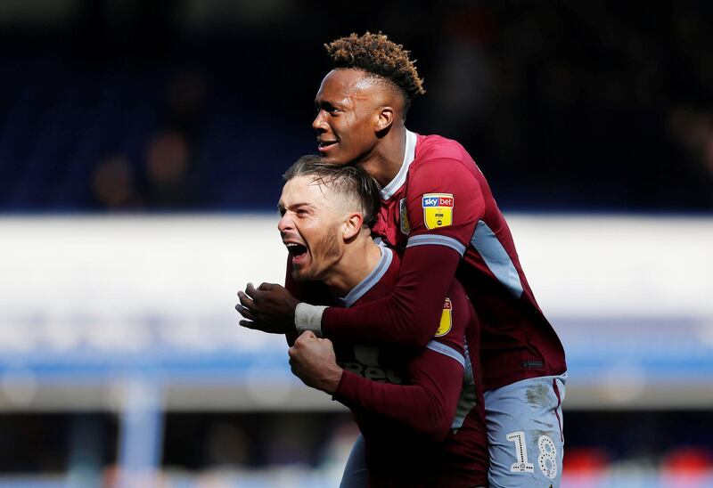 Aston Villa's Jack Grealish celebrates with Tammy Abraham. Reuters