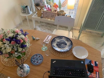 Noor Al Suweidi sets up her virtual dinner party table. Noor Al Suweidi
