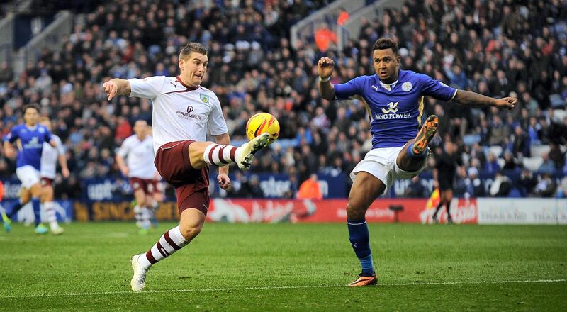 Burnley's Sam Vokes (left) and Leicester City's Liam Moore (right) battle for the ball during the Sky Bet Championship match at The King Power Stadium, Leicester.   (Photo by Nigel French/PA Images via Getty Images)