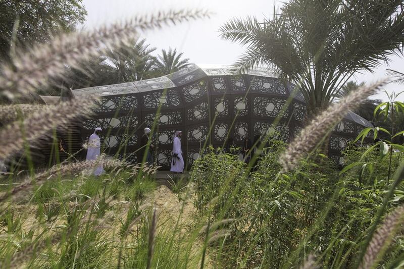 Tourists of the inaugural tour visit the Eco-Centre at Al Ain Oasis. Christopher Pike / The National