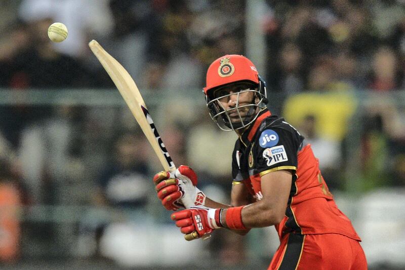 Royal Challengers Bangalore batsman Gurkeerat Singh Mann plays a shot during the 2019 Indian Premier League (IPL) Twenty20 cricket match between Royal Challengers Bangalore and Sunrisers Hyderabad at The M. Chinnaswamy stadium in Bangalore, on May 4, 2019. (Photo by Manjunath KIRAN / AFP) / IMAGE RESTRICTED TO EDITORIAL USE - STRICTLY NO COMMERCIAL USE