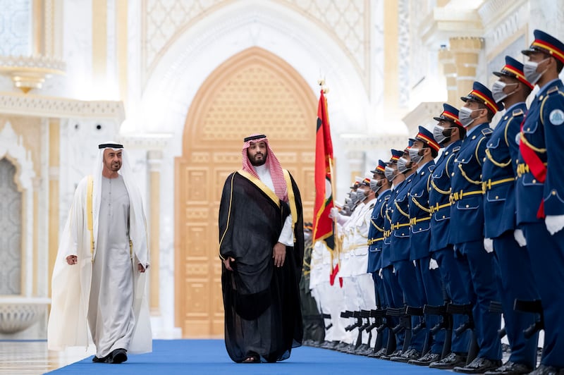 Sheikh Mohamed bin Zayed Al Nahyan, Crown Prince of Abu Dhabi and Deputy Supreme Commander of the UAE Armed Forces (L) and Crown Prince Mohamed bin Salman of Saudi Arabia (2nd L), inspect the UAE Armed Forces honour guard. UAE Ministry of Presidential Affairs