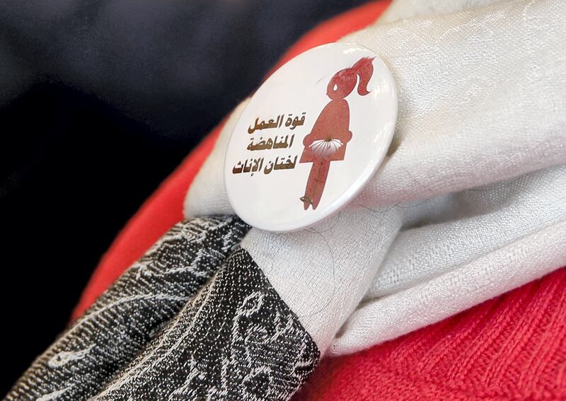 A badge reads "The power of labor aginst FGM" is seen on a volunteer during a conference on International Day of Zero Tolerance for Female Genital Mutilation (FGM) in Cairo, Egypt February 6, 2018. REUTERS/Amr Abdallah Dalsh