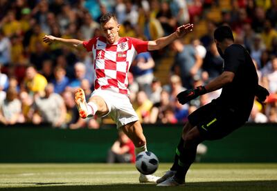 Soccer Football - International Friendly - Brazil vs Croatia - Anfield, Liverpool, Britain - June 3, 2018   Brazil's Alisson in action with Croatia's Ivan Perisic   REUTERS/Andrew Yates