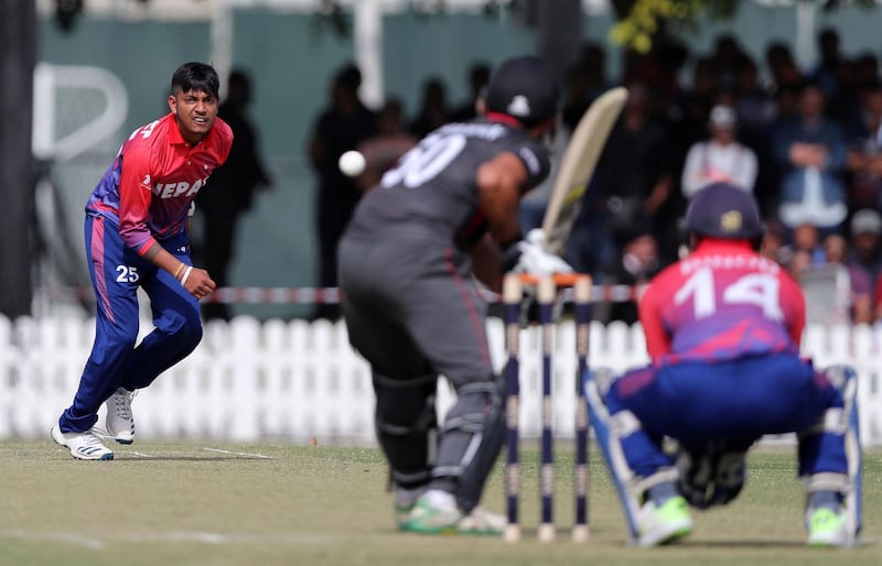 Dubai, United Arab Emirates - January 25, 2019: Sandeep Lamichhane of Nepal bowls in the the match between the UAE and Nepal in a one day internationl. Friday, January 25th, 2019 at ICC, Dubai. Chris Whiteoak/The National