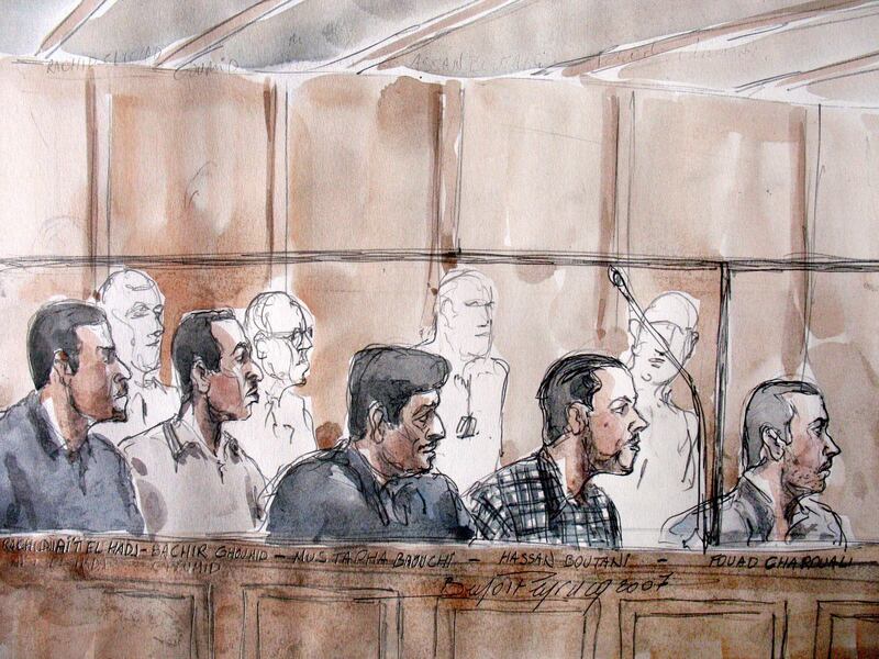 An artist rendering shows (From L) Rachid Ait El Hadj, Bachir Ghoumid, Mustapha Baouchi, Hassan Boutani and Fouad Charouali, accused of being members of a terrorist cell that helped stage the 2003 Casablanca bombings which killed 45 people and left dozens injured, waiting for the beginning of their trial, 04 June 2007 in Paris. Eight men -- a Turkish national and seven Moroccans or French nationals of Moroccan origin -- were arrested in a Paris suburb in 2004 and face charges of criminal conspiracy in relation with a terrorist undertaking. They are accused of being members of the Moroccan Islamic Combatant Group (GICM), which is suspected of having links to Al-Qaeda and of involvement in the Madrid train bombings in 2004. The trial is scheduled to continue until 20 June 2007.  AFP PHOTO BENOIT PEYRUCQ (Photo by BENOIT PEYRUCQ / AFP)