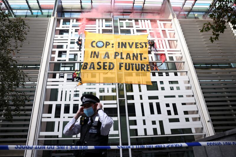 Animal Rebellion activists have climbed the UK Department for Environment, Food and Rural Affairs (Defra) office in London. Reuters