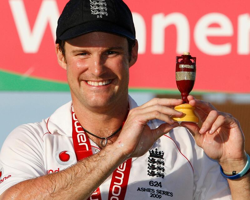 England's captain Andrew Strauss holds the Ashes urn as the England team celebrate beating Australia to win the Ashes on the fourth day of the fifth and final Ashes cricket Test match at the Brit Oval in London, on August 23, 2009.  AFP PHOTO/IAN KINGTON (Photo by IAN KINGTON / AFP)