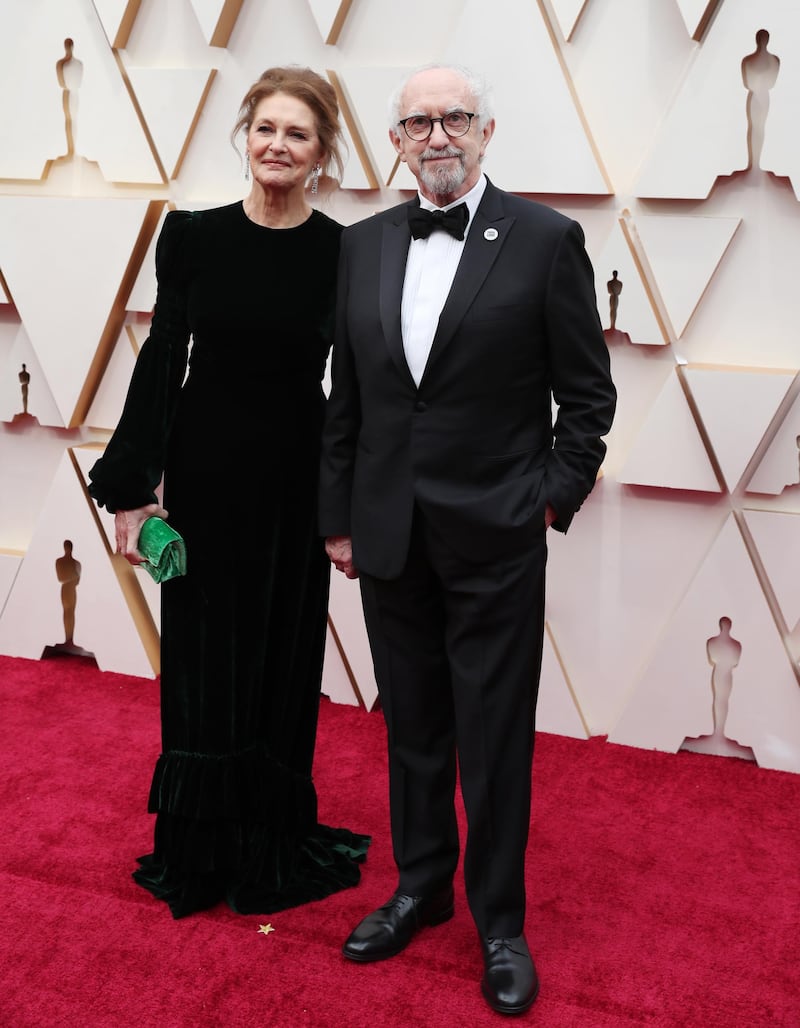 Jonathan Pryce and Kate Fahy arrive at the Oscars on Sunday, February 9, 2020, at the Dolby Theatre in Los Angeles. AFP