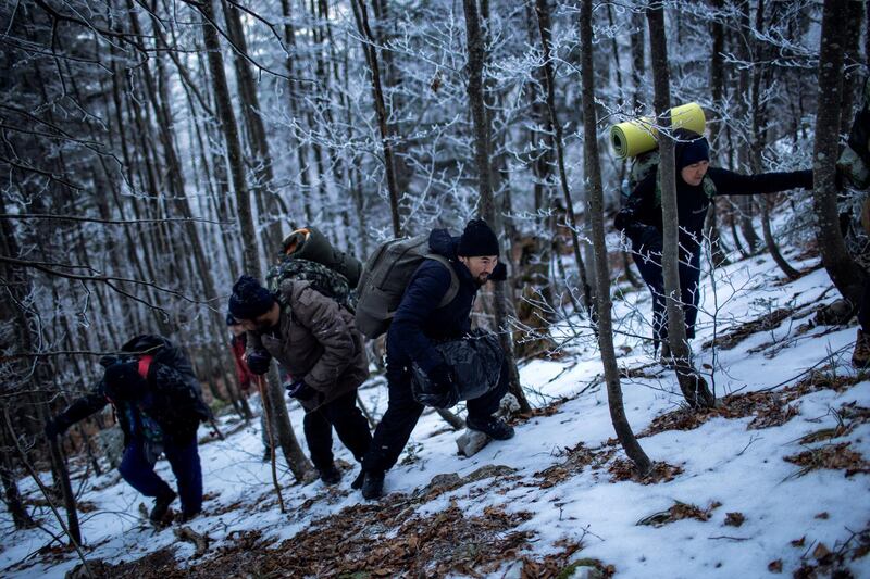 Hossein climbs the mountain together with Rahim and the rest of Afghan migrants during their journey through the forest towards the border with Croatia.


