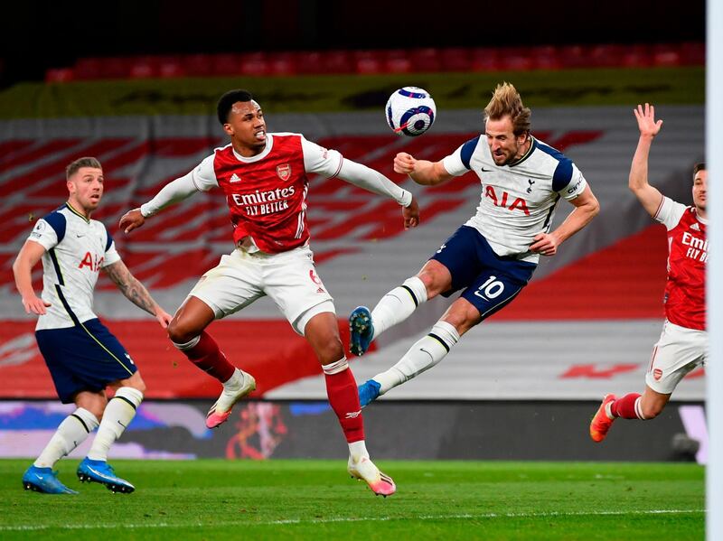 Tottenham's Harry Kane against Arsenal's Gabriel. EPA