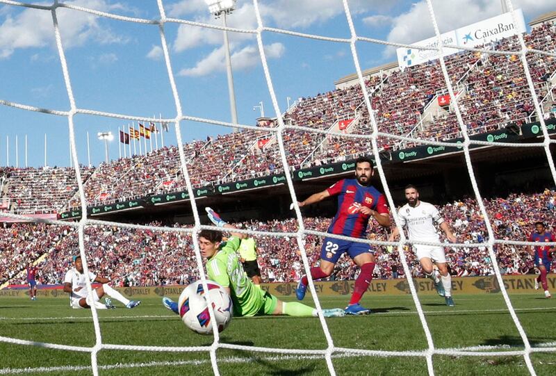 Barcelona's Ilkay Gundogan scores their first goal. Reuters