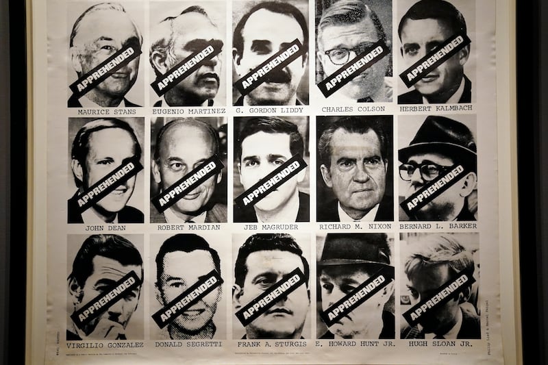 A wanted poster features key people involved in the Watergate scandal at the National Portrait Gallery in Washington. EPA