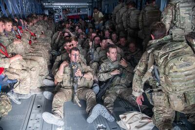 UK military personnel onboard a A400M aircraft departing Kabul, Afghanistan. PA