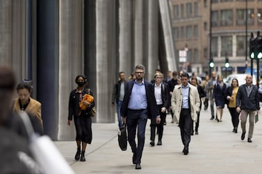 Morning commuters arrive in the City of London, UK, on Monday, May 16, 2022.  The Office for National Statistics (ONS) will release the latest UK Labor Market Statistics on Tuesday. Photographer: Jason Alden / Bloomberg 