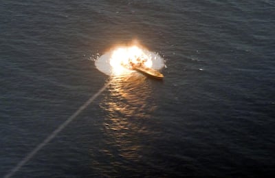 An explosion is seen after a new Iranian locally made cruise missile was fired during war games in the northern Indian Ocean and near the entrance to the Gulf, Iran June 17, 2020. Picture taken June 17, 2020. WANA (West Asia News Agency) via REUTERS ATTENTION EDITORS - THIS PICTURE WAS PROVIDED BY A THIRD PARTY