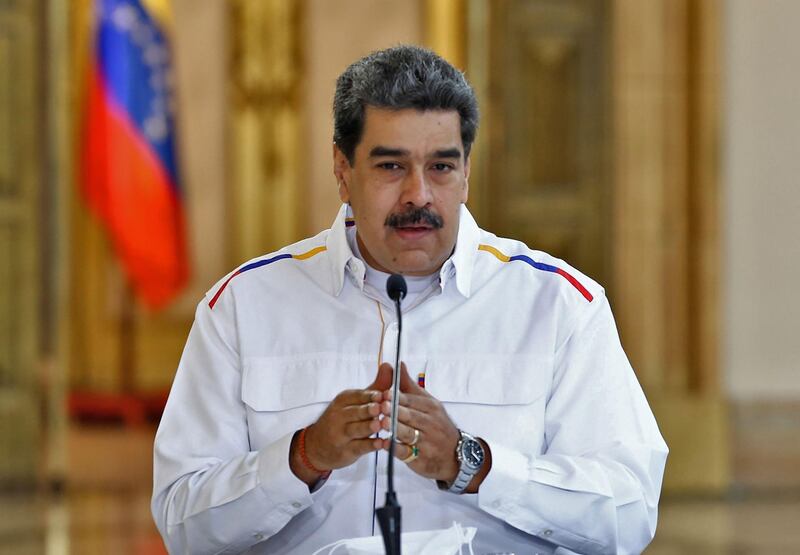 Handout picture released by the Venezuelan Presidency showing Venezuela's President Nicolas Maduro speaking during a televised message announcing new arrests related to an alleged failed bid to topple him, at Miraflores Presidential Palace in Caracas on May 9, 2020, during the novel coronavirus, COVID-19, pandemic. Venezuelan military said it had thwarted an attempted invasion by mercenaries in the early hours of May 3. Maduro has accused US President Donald Trump of being behind the alleged invasion while Trump has roundly rejected the accusation, telling Fox News on May 8: "If I wanted to go into Venezuela I wouldn't make a secret about it." - RESTRICTED TO EDITORIAL USE - MANDATORY CREDIT "AFP PHOTO / VENEZUELA'S PRESIDENCY / MARCELO GARCIA" - NO MARKETING - NO ADVERTISING CAMPAIGNS - DISTRIBUTED AS A SERVICE TO CLIENTS
 / AFP / Venezuelan Presidency / Marcelo GARCIA / RESTRICTED TO EDITORIAL USE - MANDATORY CREDIT "AFP PHOTO / VENEZUELA'S PRESIDENCY / MARCELO GARCIA" - NO MARKETING - NO ADVERTISING CAMPAIGNS - DISTRIBUTED AS A SERVICE TO CLIENTS
