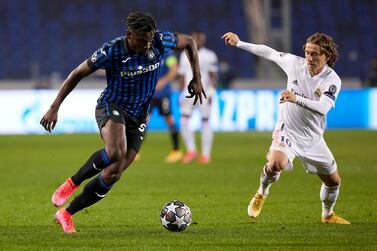 Duvan Zapata, left, and Atalanta are aiming to overturn the 1-0 deficit held by Real Madrid in the Uefa Champions League Round of 16. Getty Images
